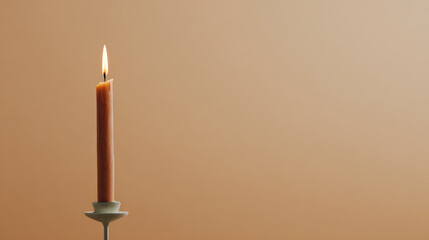 simple candle with augmented flame animation softly illuminated against clean background