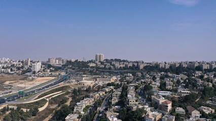 Northern Jerusalem aerial view

A wide drone shot overlooking northern Jerusalem with residential neighborhoods, highways, and distant desert hills on the horizon.