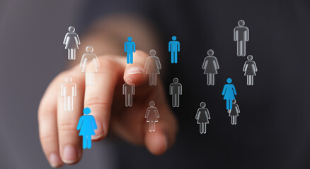 Concept of choosing team members, leadership, and human resources. Digital hand pointing at group...