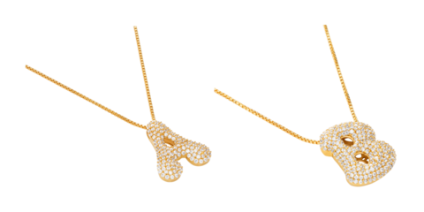 Close-up hand decoration of a gold insect on nature background isolated near a heart for Christmas