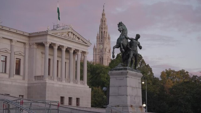 Austrian Parliament and Pallas Athene Fountain at Dusk , Vienna Austria Landmarks with Horse Tamer Statues