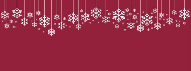 Festive holiday border/banner with white hanging snowflakes of varying sizes suspended by thin lines against a deep red background. Simple, elegant design suitable for Christmas, New Year