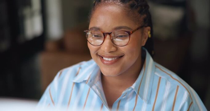 African woman, reading and computer in home for feedback, information and article post. Person, remote work and glasses reflection with pc for proofreading news, update draft and story publication