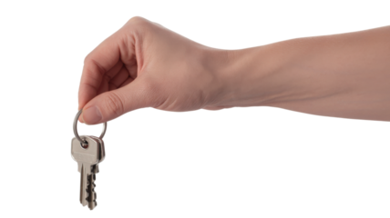 Hand holding silver keys isolated on a transparent background