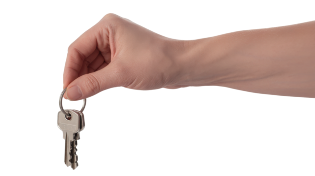 Hand holding silver keys isolated on a transparent background