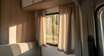 Cozy camper van interior with light curtains and wooden accents  