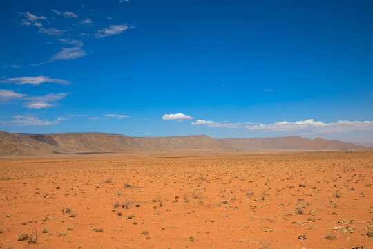 Panoramic view of the landscape of the Namib-Naukluft National Park. This national park in Namibia encompasses parts of the Namib Desert and the Naukluft Mountains. Namibia, Africa. Copy space