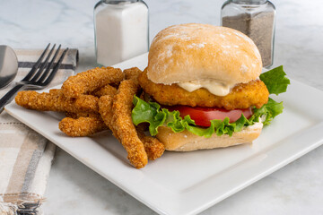 chicken breast  sandwich with chicken fries