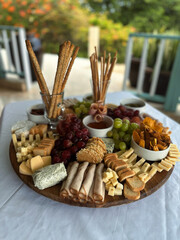 Gourmet Charcuterie Board with Cheese, Grapes, and Meats