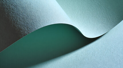 Textured paper curves in soft teal and blue hues abstract background