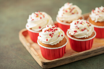 Homemade cupcakes with whipped cream for Holidays