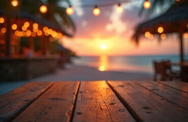 Wooden table foreground with blurred beach bar setting during warm sunset. Ocean waves gently wash shore under festive string lights, calm vacation ambiance. Space for text, copy. Relaxing