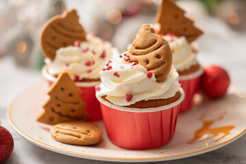 Homemade cupcakes with whipped cream and gingerbread cookies for Holidays