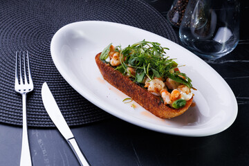 Delicious shrimp toast on rye bread: a healthy breakfast