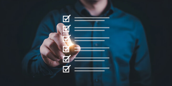 Person s finger tapping a digital checklist with completed tasks highlighted on a dark background