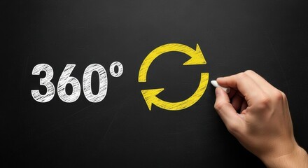 Hand drawing a 360 degree symbol with arrows on a blackboard