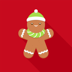 Gingerbread man wearing green scarf and hat on red background