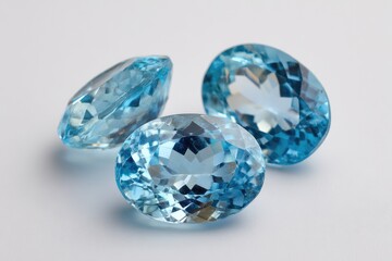 Fototapeta premium Three light-blue gemstones