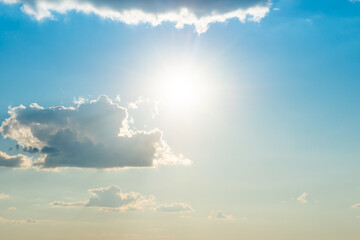 Sun light through cloud on blue sky. Blue sky, clouds and sun light