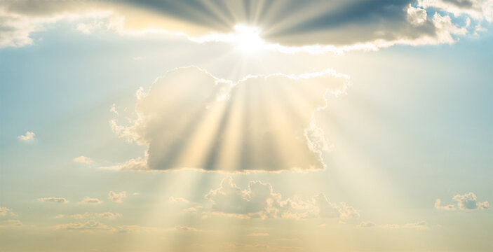 Sun light through cloud on blue sky. Blue sky, clouds and sun light