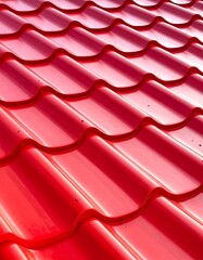 Close-up of a Red Metal Roof with a Wavy Pattern.