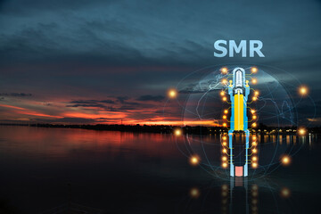 SMR text and small nuclear power plant icon on sunset background.