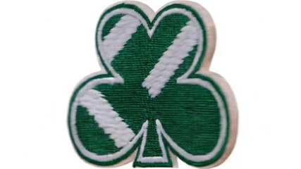 Close up of a green shamrock emblem with white diagonal stripes - Powered by Adobe