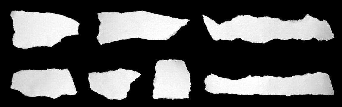 A collection of irregular torn white paper pieces isolated on a black background, featuring raw edges and natural shapes, ideal for collage design, creative artwork, scrapbooking, posters, and graphic