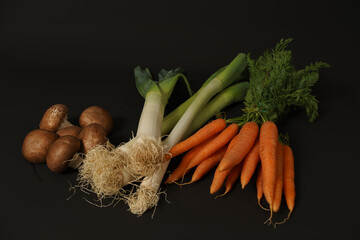 Fresh vegetables with mushrooms, leek, and carrots