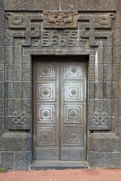 Amsterdam, The Netherlands, September 29, 2025 - Door of the Art Deco 1926 De Bazel building, a former bank for the Dutch Trade Company housing the Amsterdam City Archives
