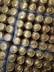 Beer cans. Aluminum beer cans in supermarket. Beer products on shop shelves