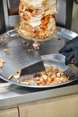 Cooking of pork shawarma in the Armenian restaurant