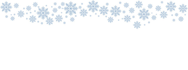 Fototapeta premium Winter snow border with pale blue snowflakes of varying sizes drifting down from the top edge against a clean white background. Minimalist, cold-toned design suitable for Christmas, New Year