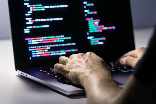 Cyber attack or malware hacker. Cyberattack to computer data. Cybersecurity. Ransomware code. Security software against spyware. Fraud, virus or breach threat. Man and laptop. - Powered by Adobe