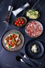 Vibrant Spread of International Dishes on a Rustic Wooden Table, Showcasing a Variety of Flavors