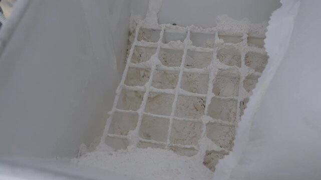 Flour Sifting in an Industrial Sifter. Bakery Shop