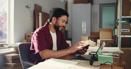 Man, phone and happy for dropshipping, logistics and laptop for deal, notification or sale at office. Person, entrepreneur and smartphone with mobile app, contact or supply chain at small business - Powered by Adobe