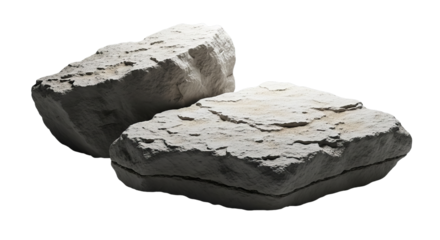 Two rough textured light gray rocks on black background