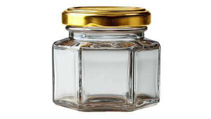 Close-up studio shot of a small, hexagonal glass jar with a shiny gold lid