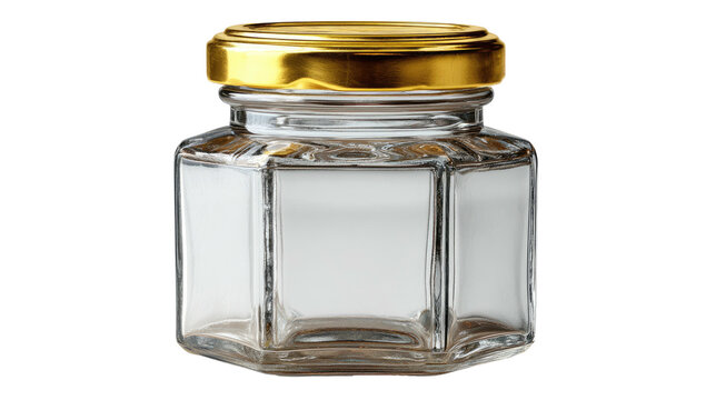 Close-up studio shot of a small, hexagonal glass jar with a shiny gold lid