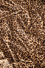 leopard print fabric with soft folds.