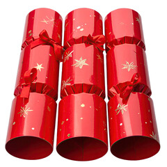 Three festive red Christmas crackers with golden star decorations and ribbons.