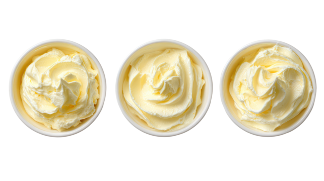 Three oval dishes of creamy yellow butter isolated on transparent background