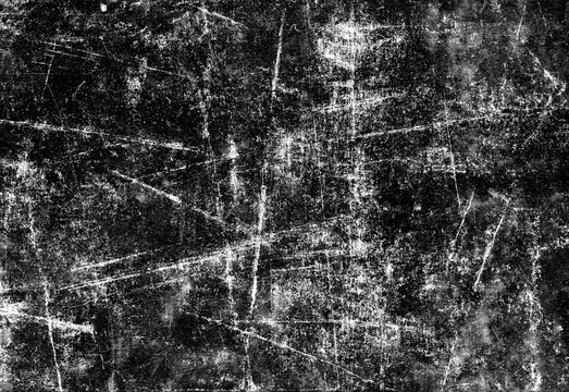High resolution black grunge texture featuring distressed surface with random scratches and worn effects, ideal for dark backgrounds, overlays, posters, typography and design work.
