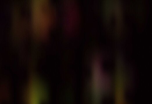 Abstract dark moody background featuring soft vertical blur with scattered colorful bokeh lights, atmospheric texture ideal for dramatic design, cinematic visuals