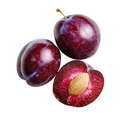 Three plums, one halved, vibrant deep purple-red, showing a light pinkish-red interior and a light-tan seed