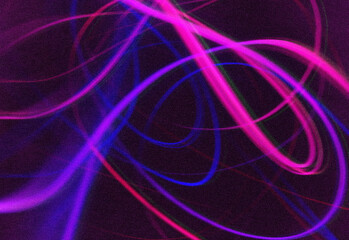 Abstract neon light trails in pink, purple, and blue weaving across a dark background, creating a dynamic sense of motion, energy, and futuristic ambience suitable for design