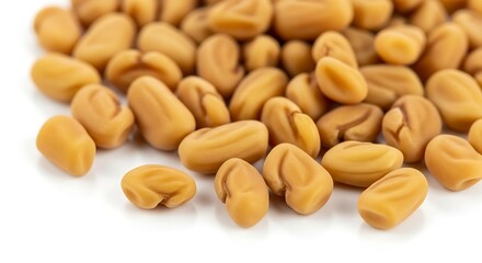 Close up of dried fenugreek seeds on white background