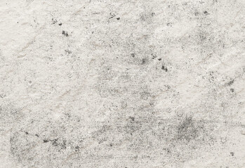 Close up of a weathered concrete surface with mottled gray texture and speckled patterns, ideal industrial background for architecture, design, and construction projects