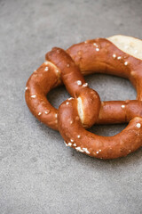 Delicious traditional Bavarian Brezeln or pretzels with a brown salty crust. German Pretzel Brezel. Food on Oktoberfest